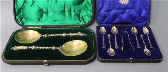 A pair of Victorian silver-gilt apostle serving spoons and a set of six silver coffee spoons and sugar tongs, approx 7.6oz gross